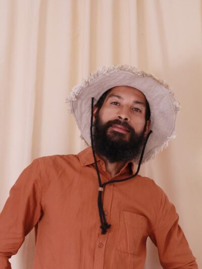 model wearing natural Fisherman Cruiser Hemp Hat, Hand-made in Nepal